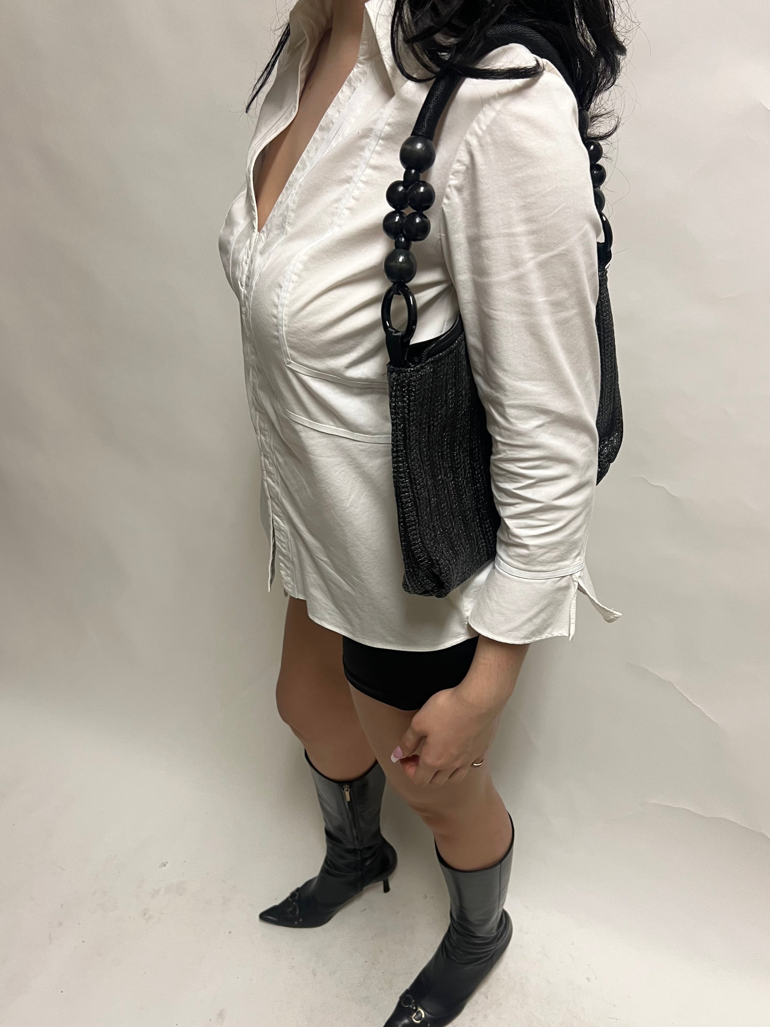 Black beaded handle woven bag